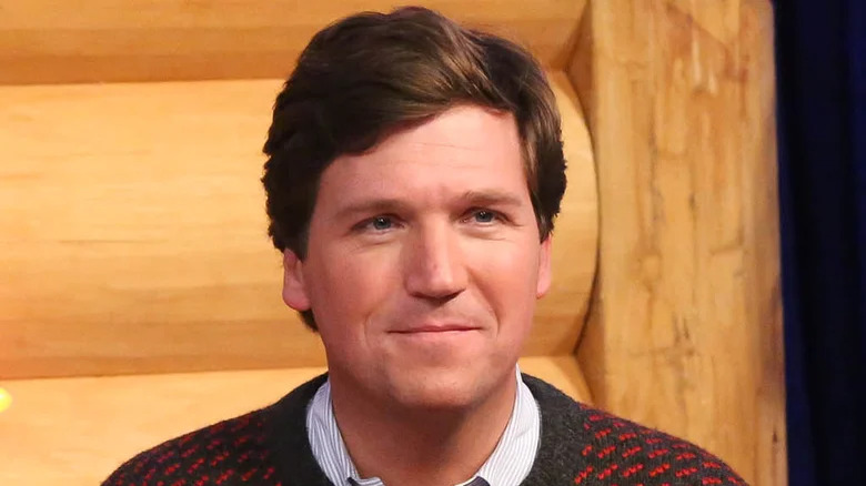 Tucker Carlson grinning