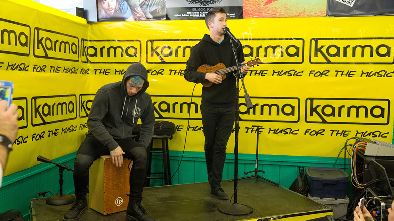 Twenty one pilots performing at a record store 