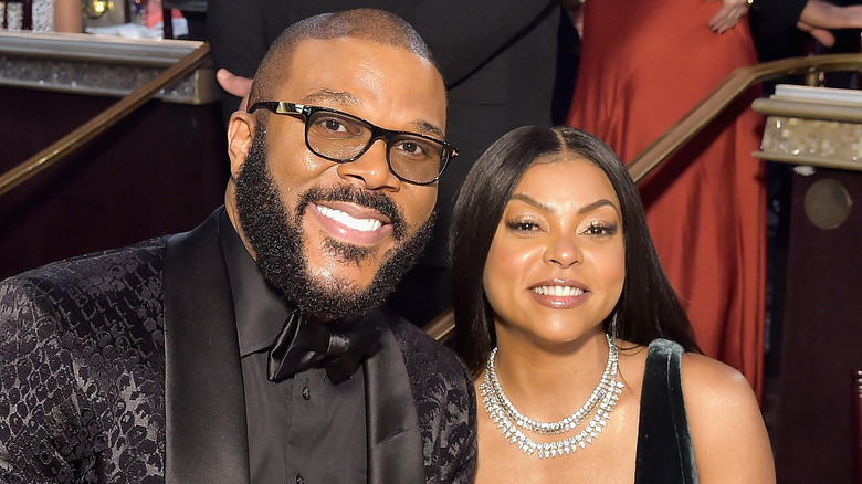 Tyler Perry and Taraji P. Henson at a dinner
