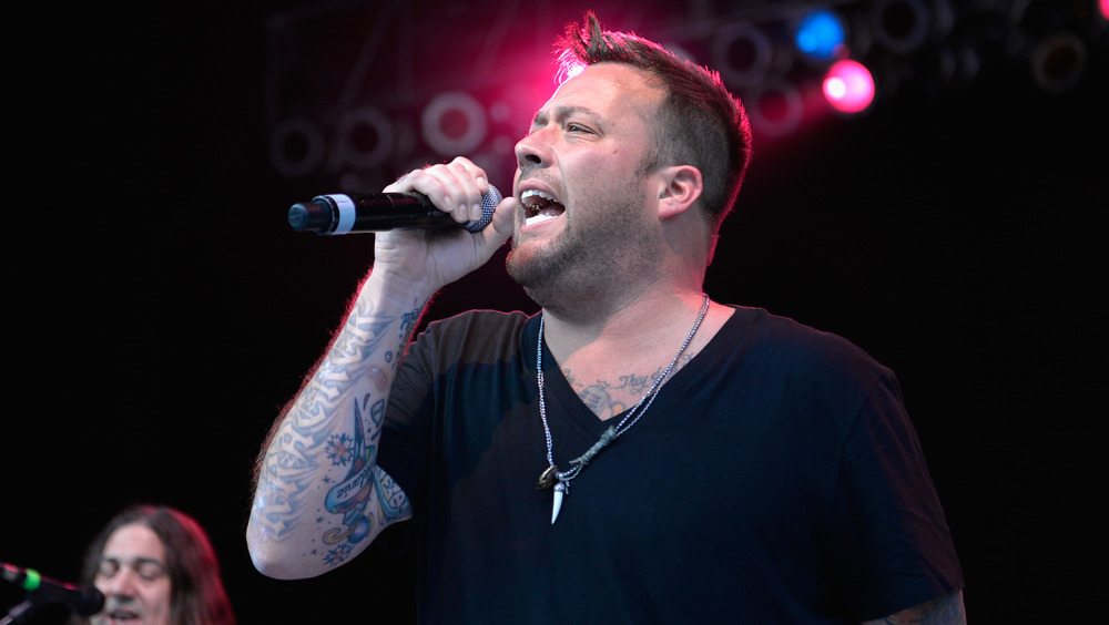 Uncle Kracker singing during the Under The Sun Tour