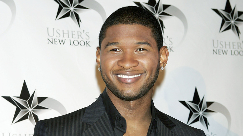 Usher at event promoting Usher's New Look