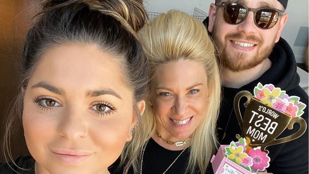 Victoria Caputo, Theresa Caputo, and Larry Caputo, Jr. posing for an Instagram selfie 