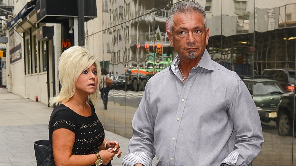 Theresa Caputo and Larry Caputo looking shocked on an NYC street