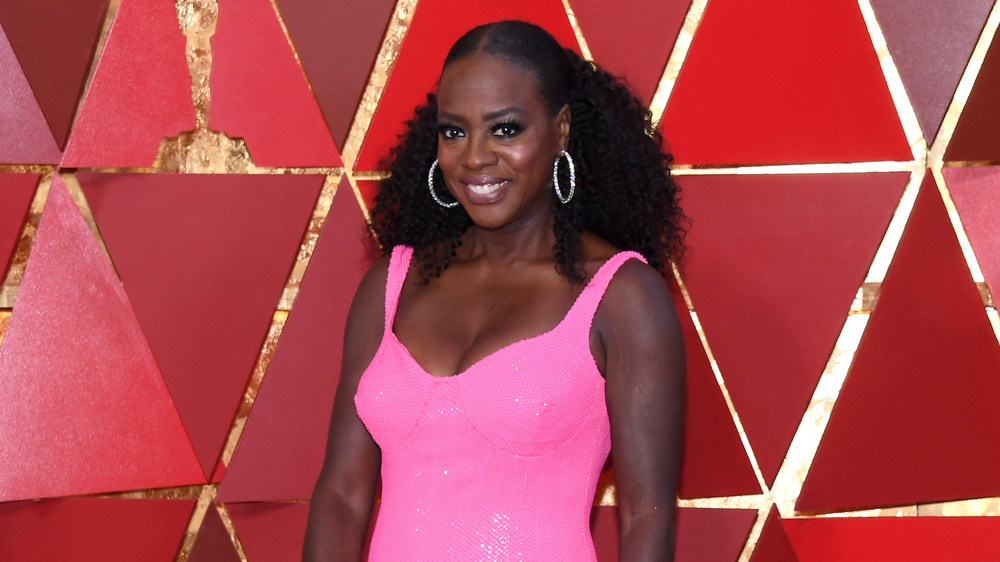 Viola Davis grinning pink dress