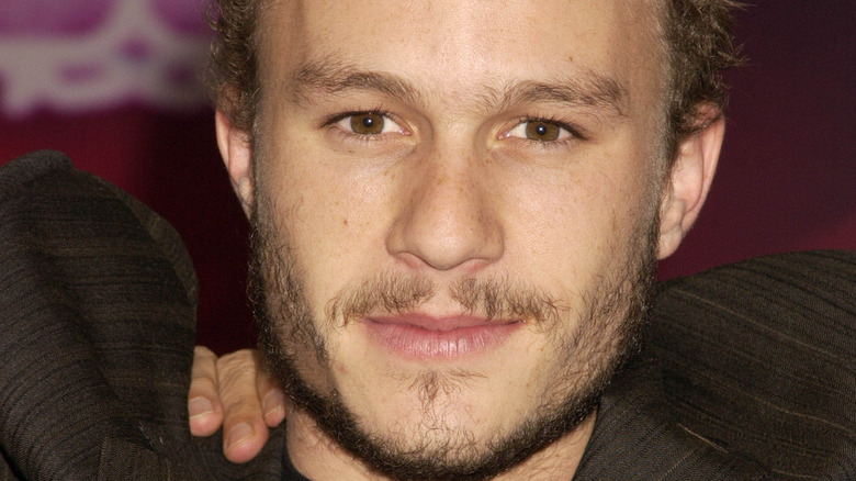 Heath Ledger posing for cameras