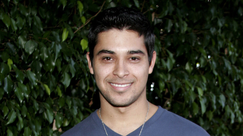 Wilmer Valderrama smiles