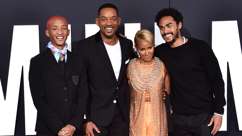 Will Smith, Jada Pinkett Smith, Jaden Smith, and Trey Smith smiling