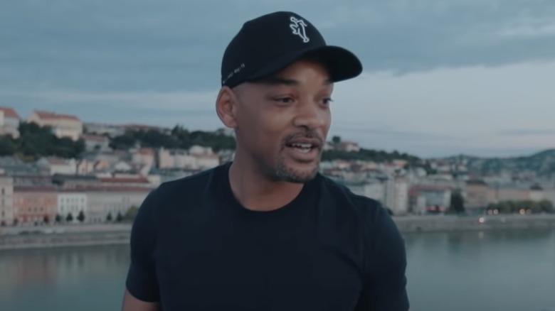 Will Smith standing on a bridge for "In My Feelings" challenge