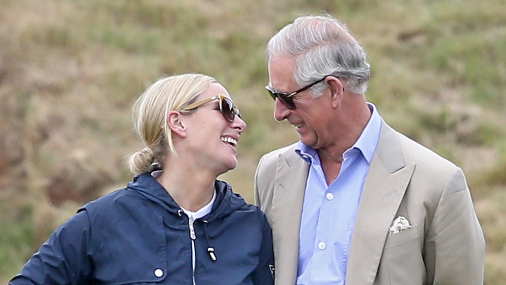 Zara Tindall and Prince Charles laughing