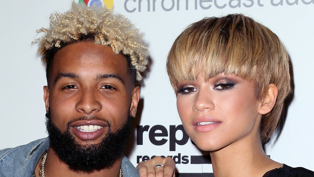 Zendaya rests her hand on Odell Beckham Jr. 