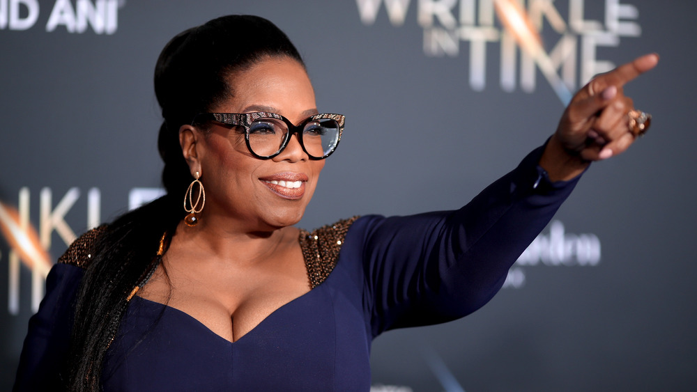 Oprah Winfrey smiling and pointing 