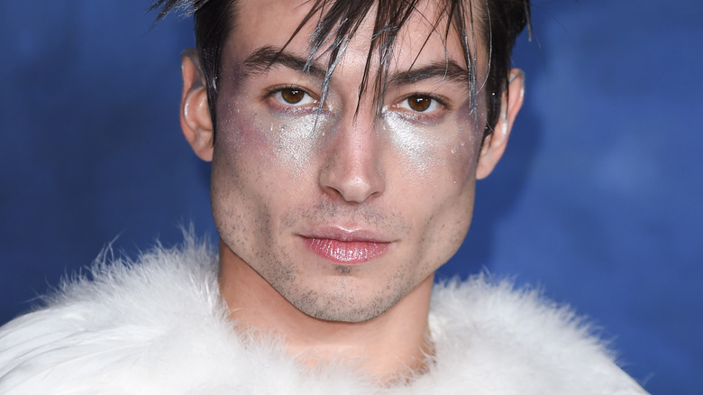 Ezra Miller glitter posing