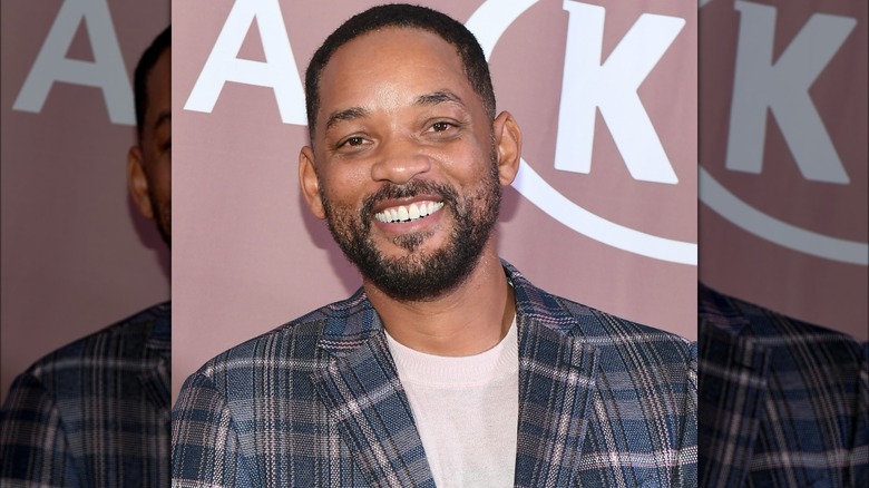 Will Smith posing for cameras