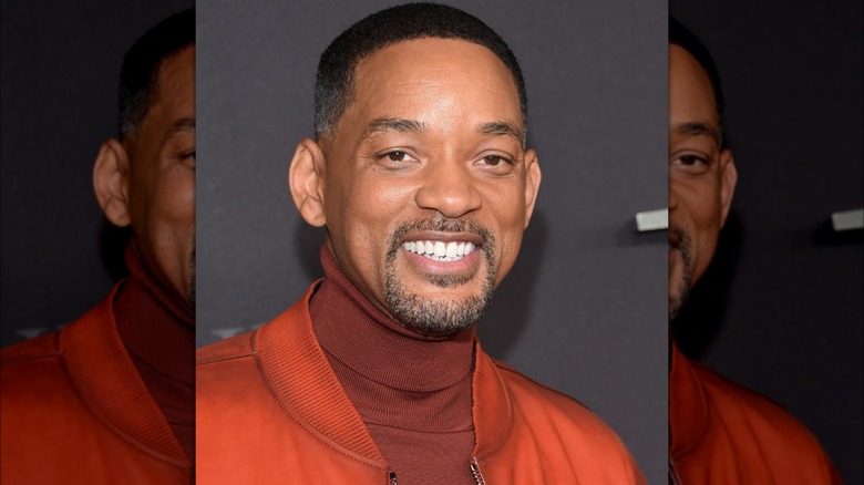 Will Smith posing for cameras