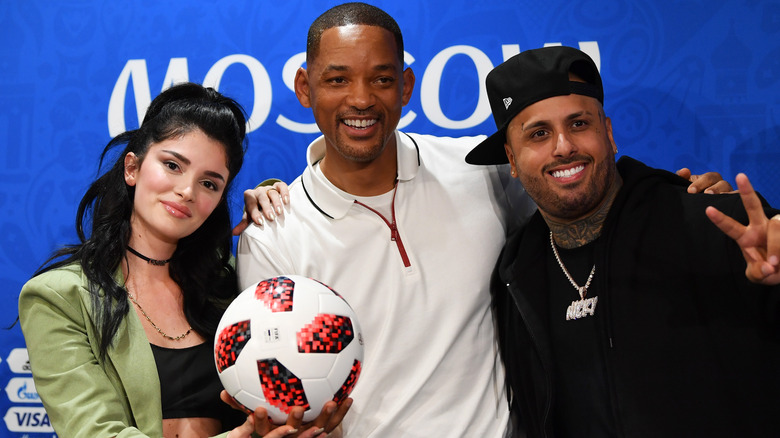 Era Istrefi, Will Smith, and Nicky Jam posing