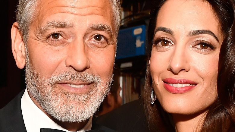 George Clooney, Amal Clooney smiling