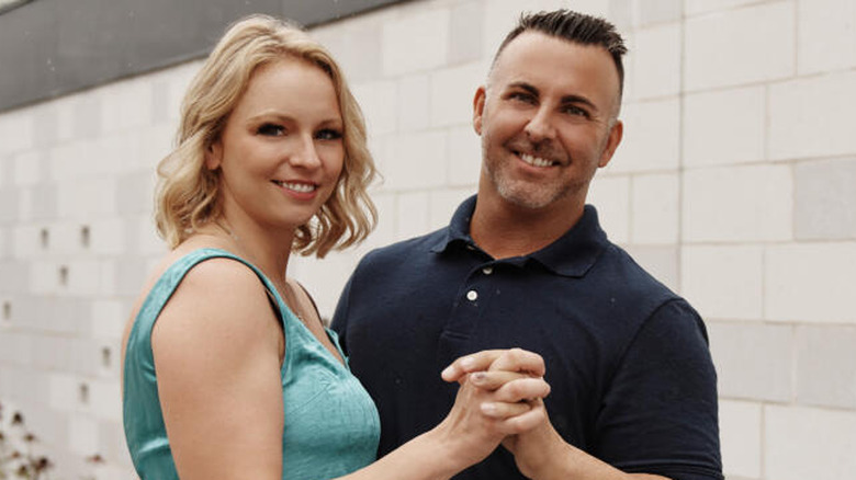 Lindsey Georgoulis Mark Maher holding hands married at first sight