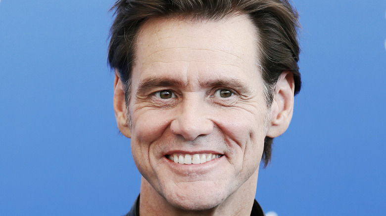 Jim Carrey smiles on the red carpet