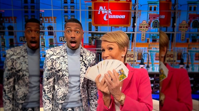 Nick Cannon and Barbara Corcoran posing