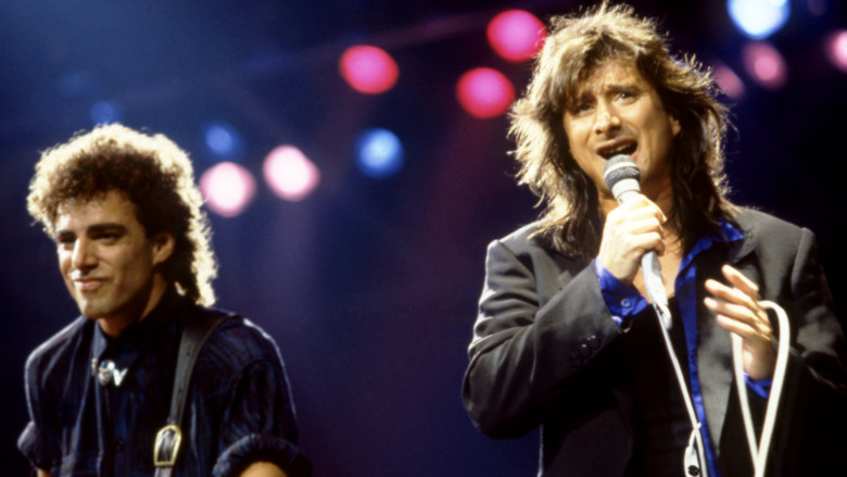 Neal Schon and Steve Perry performing with Journey in 1986