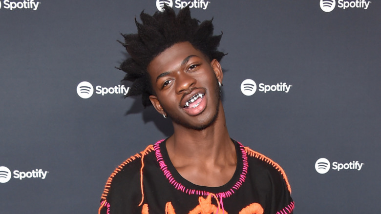 Lil Nas X wearing a fanged grill 