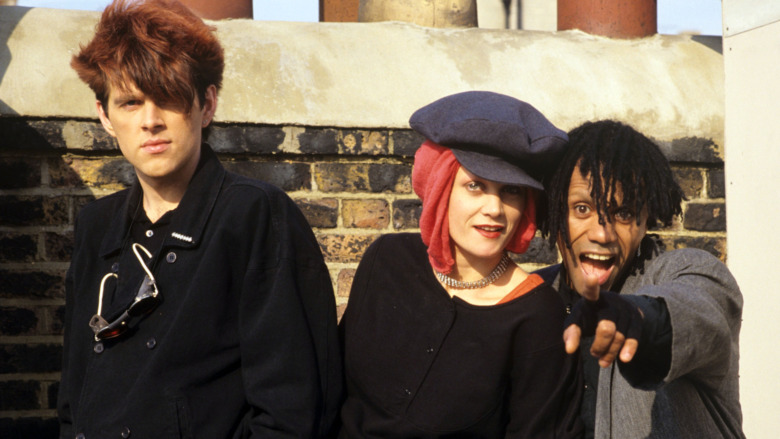 The Thompson Twins posing for a 1984 portrait 