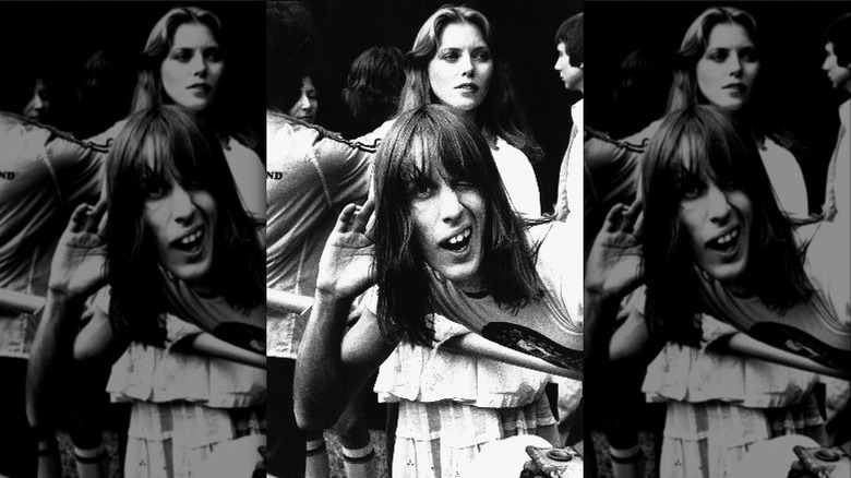 Bebe Buell and Todd Rundgren captured in a crowd