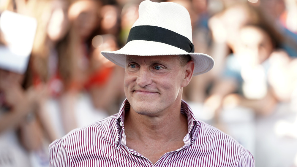 Woody Harrelson smiling a film festival in 2019