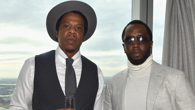 Jay-Z hat Diddy glasses sweater