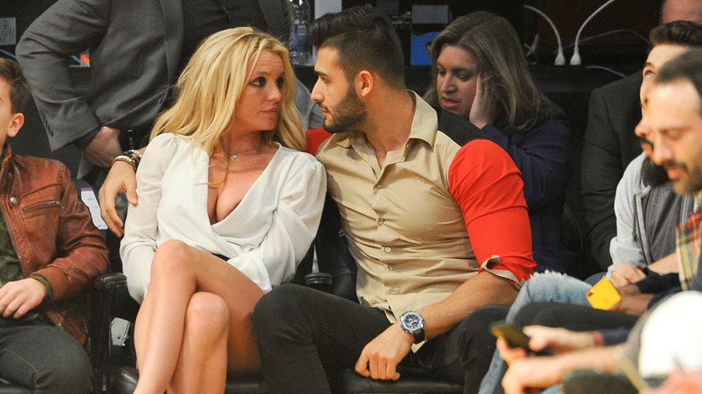 Britney Spears and Sam Asghari talking