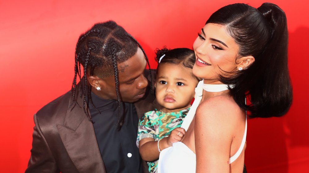 Travis Scott, Stormi Webster and Kylie Jenner attend the Travis Scott: "Look Mom I Can Fly" premiere