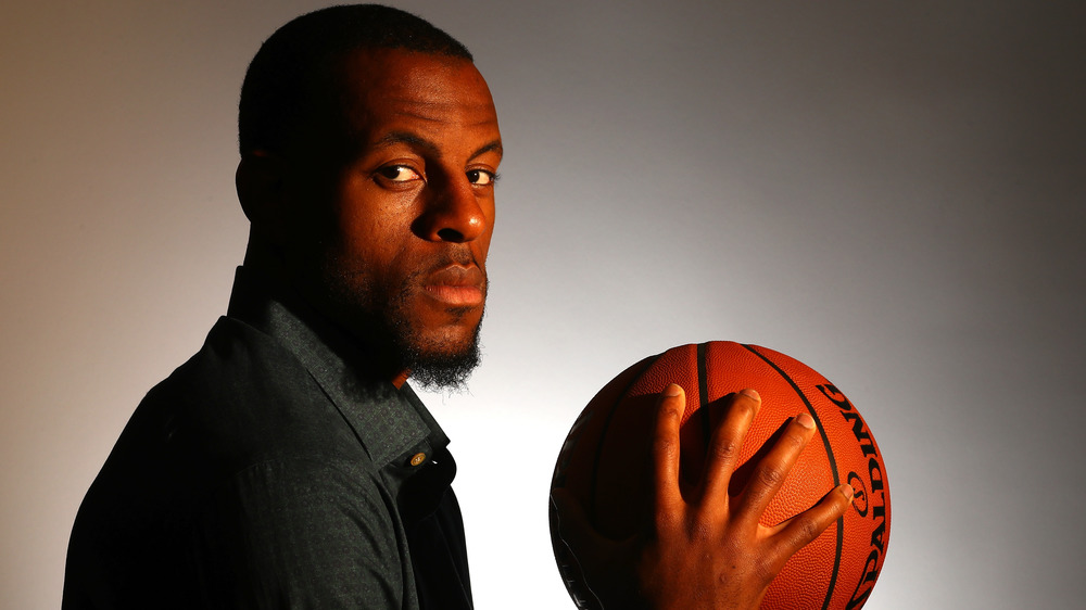 Andre Iguodala holding a basketball