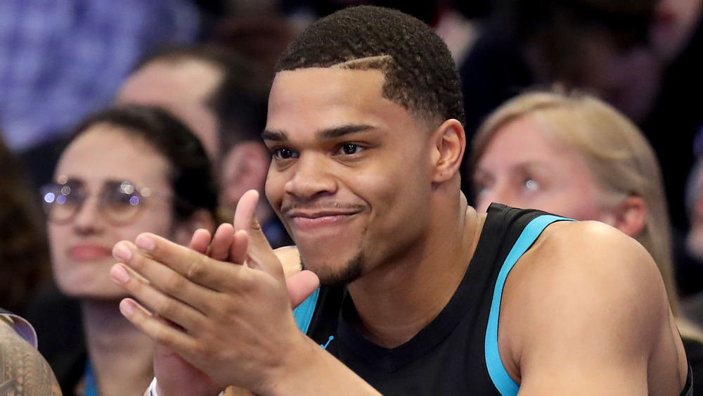 Miles Bridges smirking and clapping 