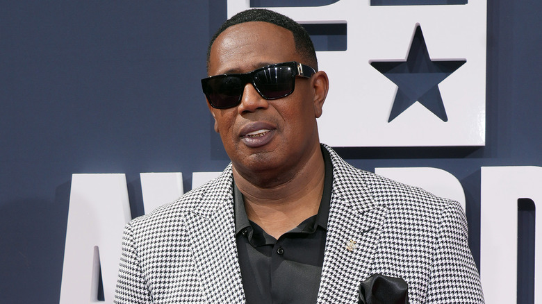 Master P wearing sunglasses