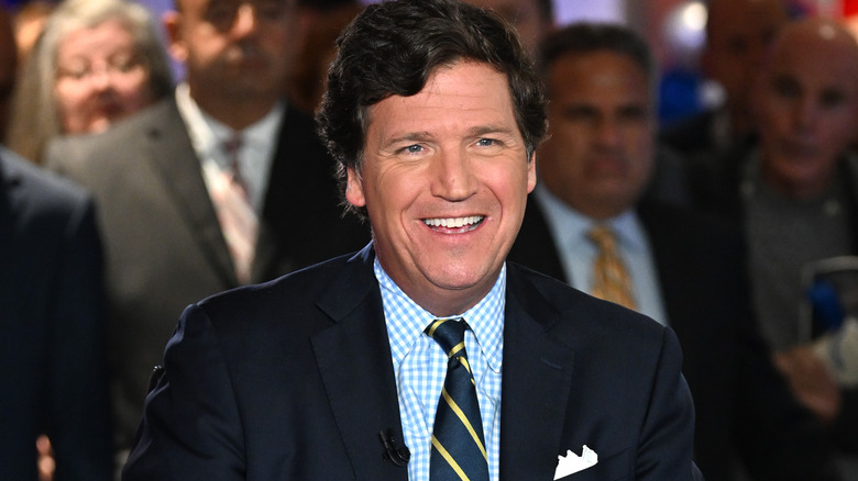 Tucker Carlson smiling