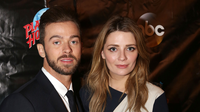 Artem Chigvintsev and Mischa Barton posing together