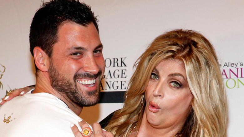 Maksim Chmerkovskiy and Kirstie Alley posing together