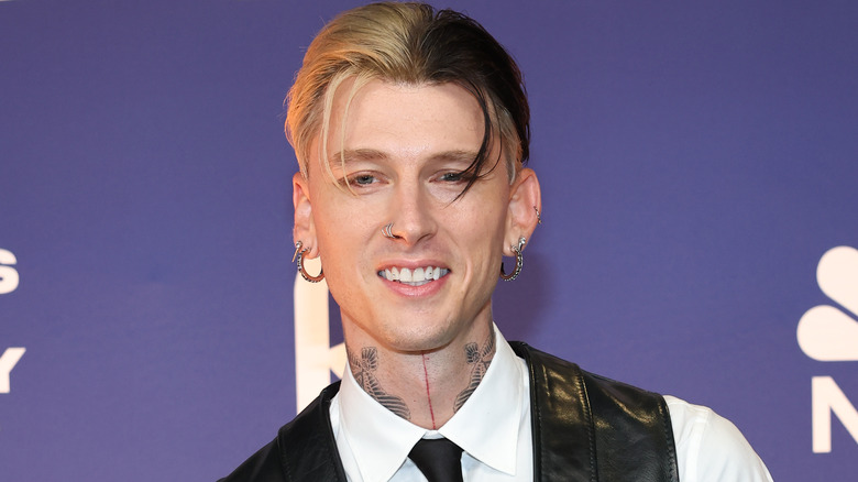 Machine Gun Kelly smiling