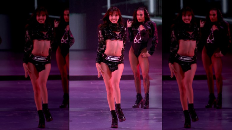 Lisa walking down a runway