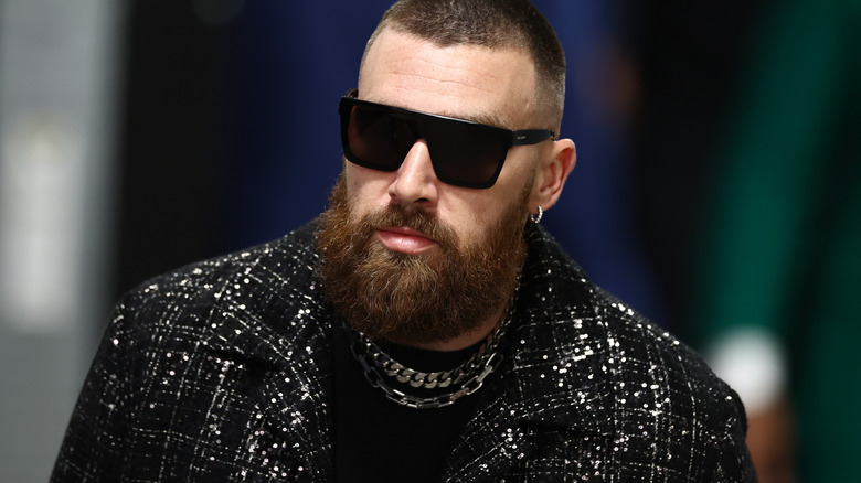 Travis Kelce sunglasses sparkly jacket