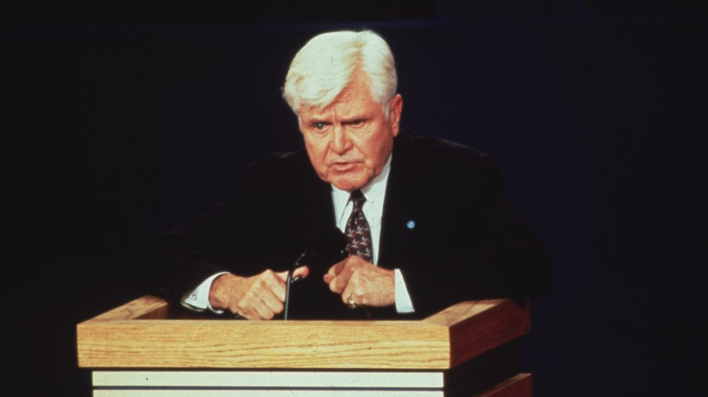 Adm. James Stockdale at podium, speaking