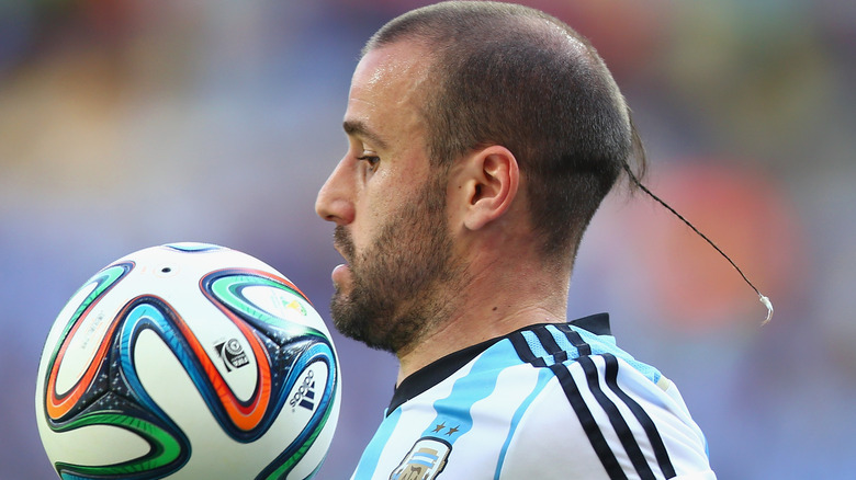 Rodrigo Palacio playing football