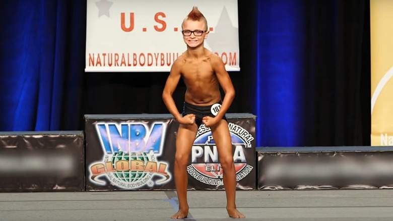 Gage Gregurich in bodybuilding competition at 11 