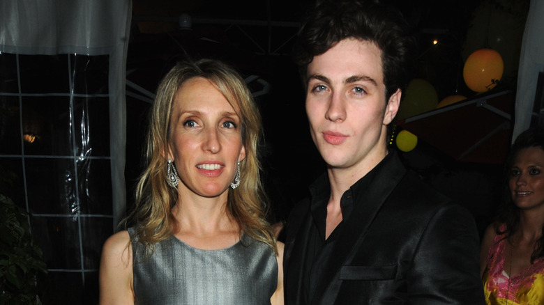 Sam and Aaron Taylor-Johnson pose in 2009