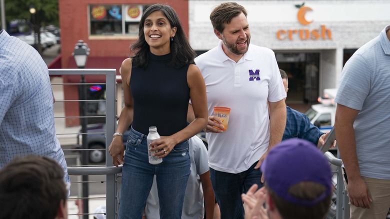 Usha JD Vance holding drinks