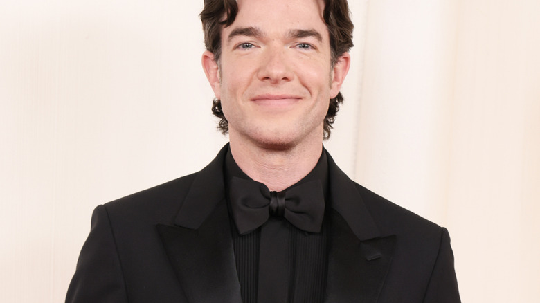 John Mulaney wearing all black