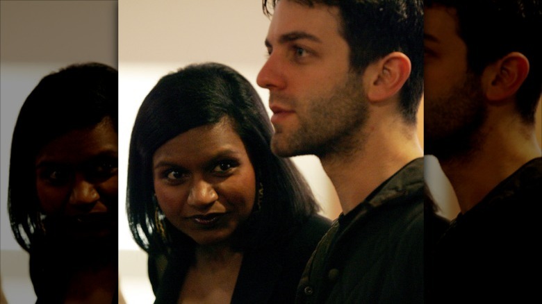 Mindy Kaling looks at B.J. Novak while he looks