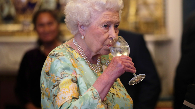 Queen Elizabeth, drinking