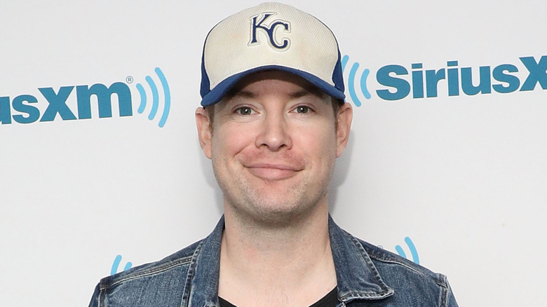 David Cook smiling for photographers at SiriusXM Studios in April 2018 in New York City