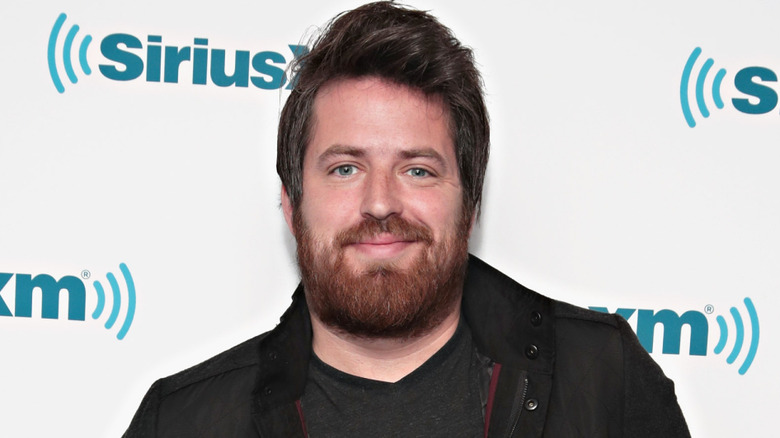 Lee DeWyze smiling at the Sirius XM Studios in February 2018 in New York City